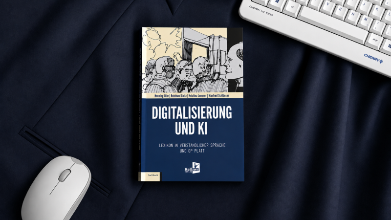 Das Cover des Lexikons zu Digitalisierung und KI auf einem Schreibtisch.